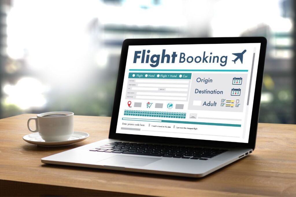 laptop open to flight booking