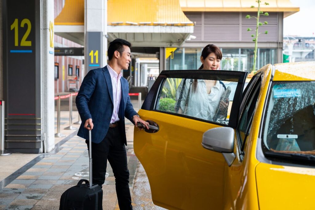 woman pick up in taxi at airport